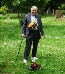 John presides over the reburial<br>of his great uncle,<br>Harry Waylen in 2017