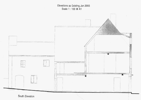 The side elevation revealing how the façade has<br>radically changed the style of the building. 