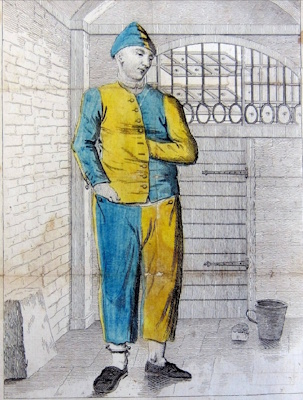Kidd Wake in a solitary cell in the uniform<br>of Gloucester Prison ©Glos. Archives<br>D/2454/1/9